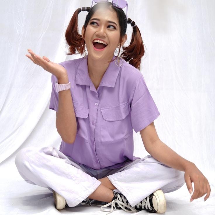 Kaveri Mehta, Lead Design Curator at Mapper Garden Studio, reviewing corporate floral arrangements